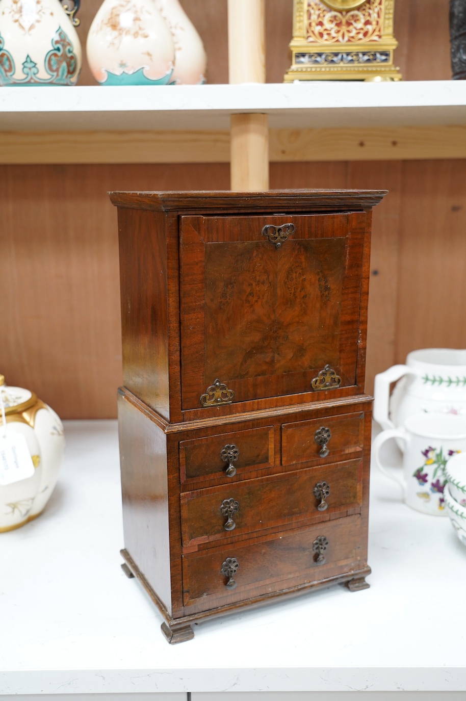 A Queen Anne style miniature walnut escritoire, 37cm. Condition - poor to fair